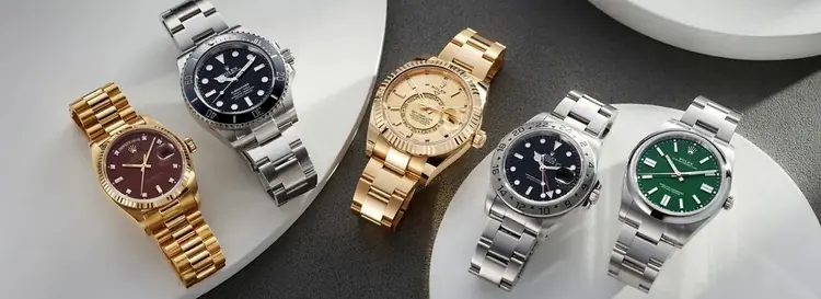 Submariner, Daytona and GMT-Master super clone Rolex watches displayed on dark background