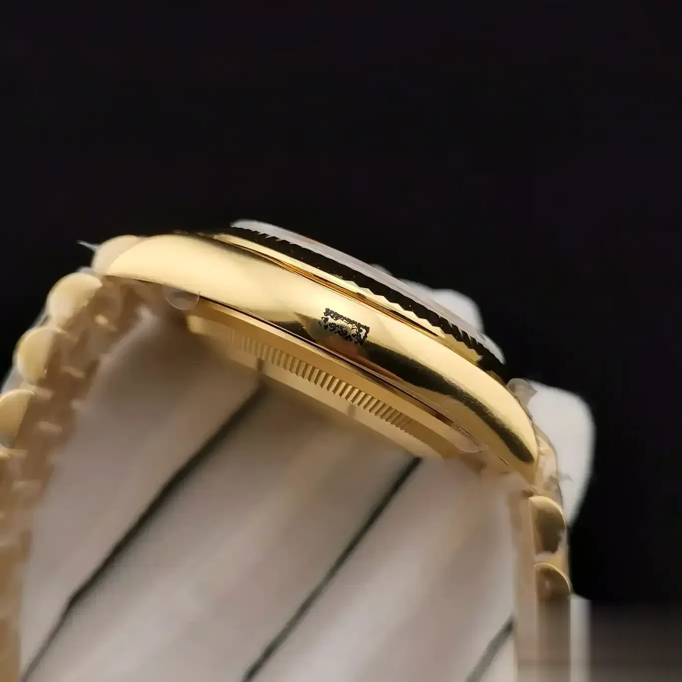 Rolex Day-Date 128238 replica black dial — bezel macro