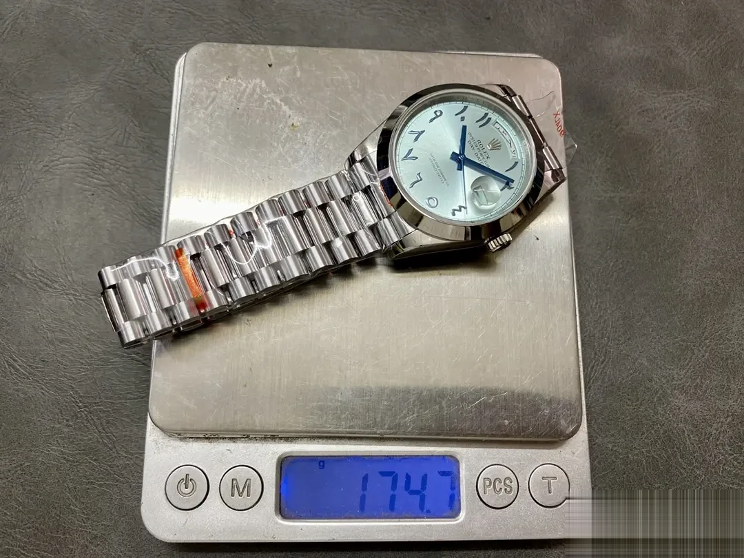 Rolex Day-Date 228206 replica 40mm — crown and case detail