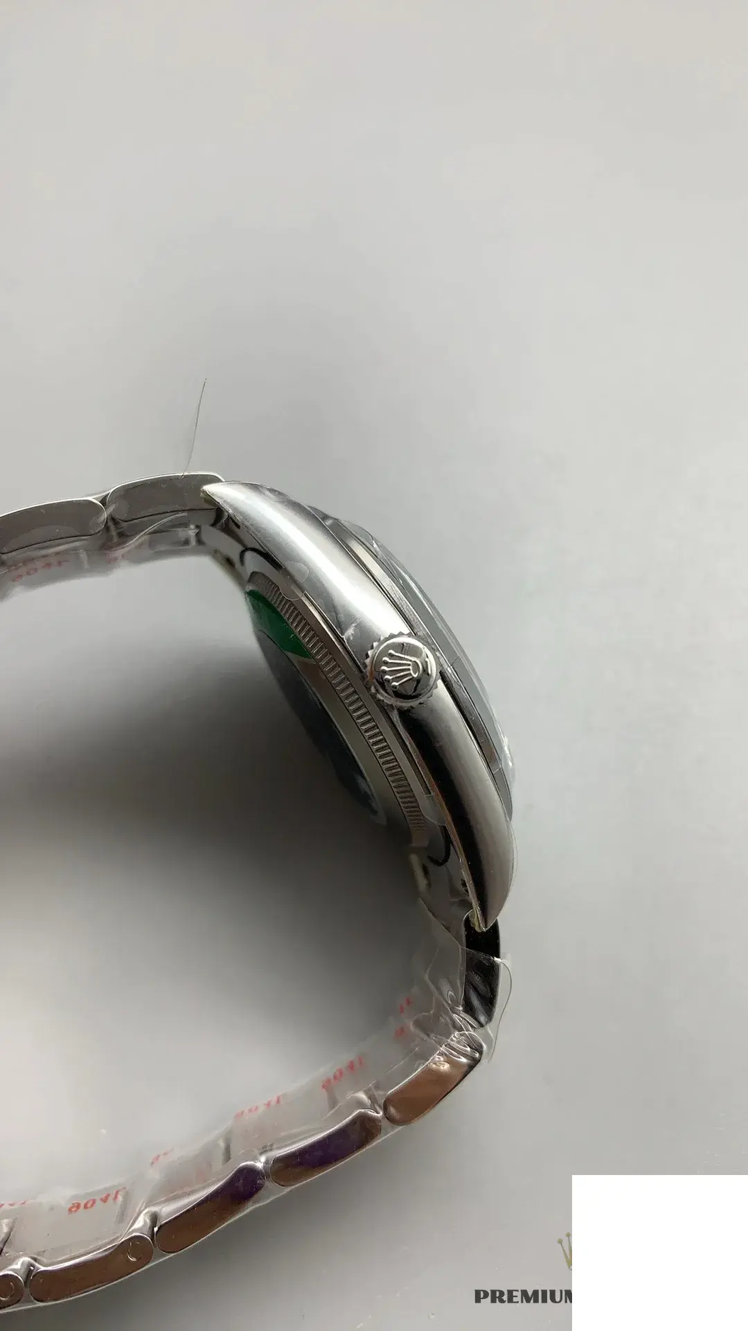 Rolex Explorer 124270 replica black dial — bezel macro