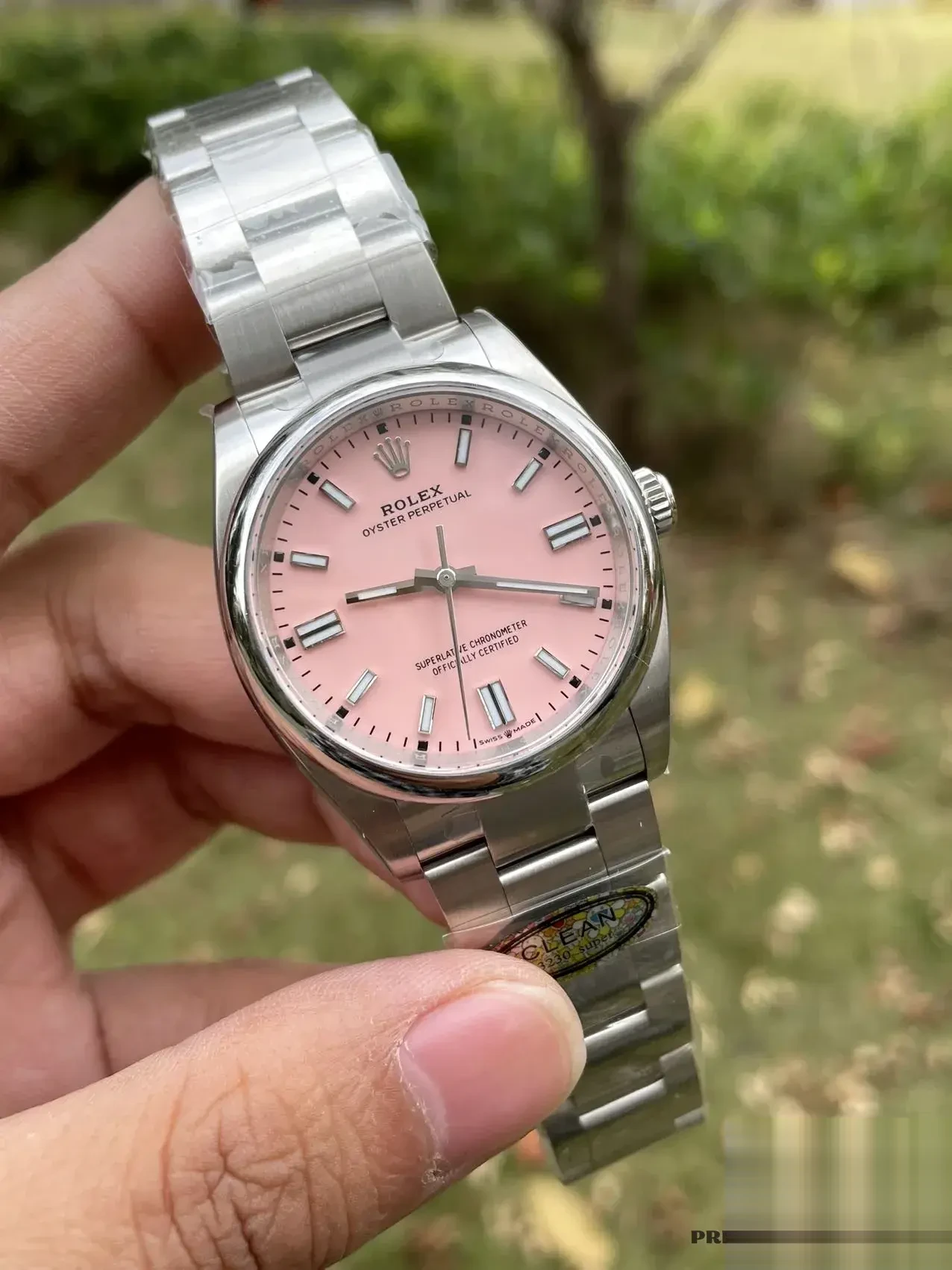 Rolex Oyster Perpetual 126000 replica black dial — angled view