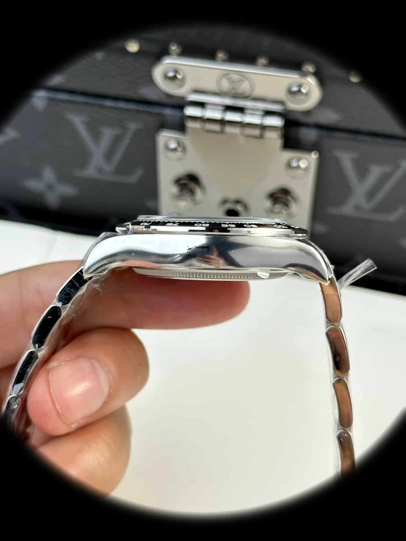 Rolex Daytona 126500LN swiss clone black dial — bezel macro