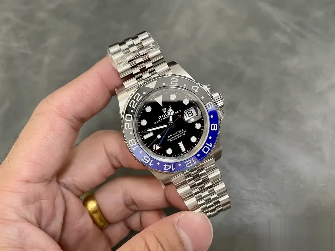 Rolex GMT-Master 126710BLNR swiss super clone 40mm — crown and case detail