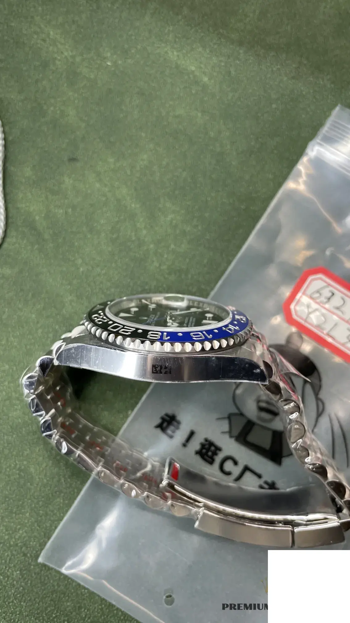 Rolex GMT-Master 126710BLNR swiss super clone — crown and case detail
