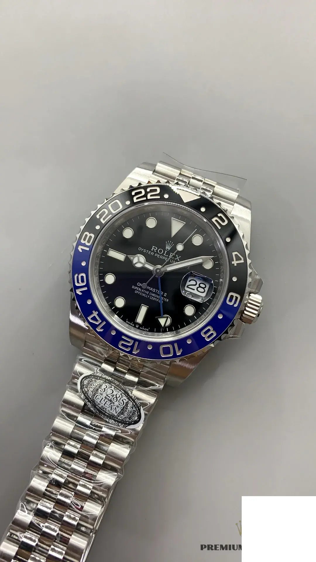 Rolex GMT-Master 126710BLNR swiss super clone green dial — crown and case detail